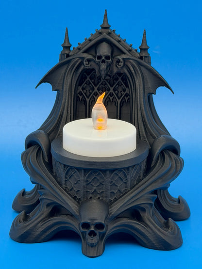 Taylor 3D black matte PLA Gothic skull and bat LED tealight holder with a lit candle